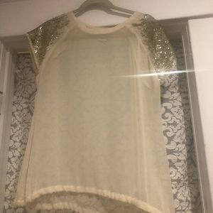 Sheer, sequence embellished top.